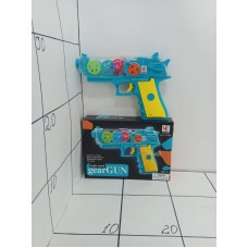Игрушка детская музыкальная пистолет с шестеренками на бат,кор